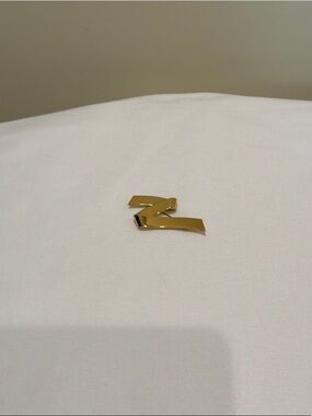 Gold Z-Shaped Metal Accent brooch by Monet